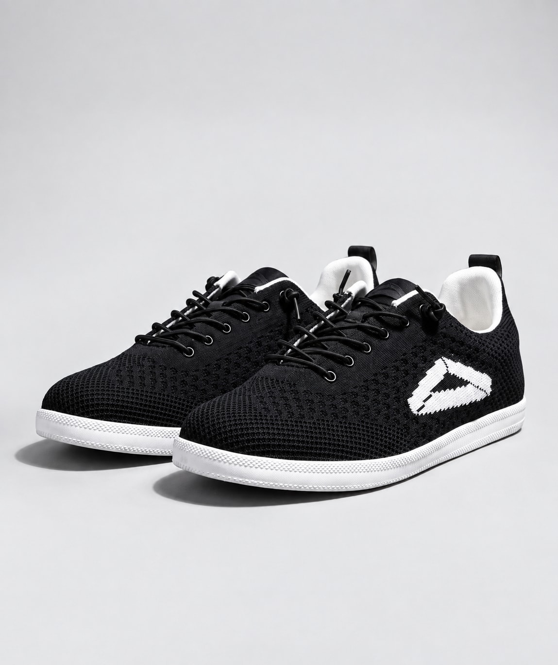 A pair of Rack Runner shoes from the front three-quarter view, the white mark on the side